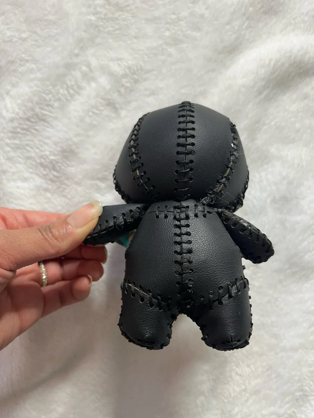Black Stitched Voodoo Doll Keychain with Turquoise Skull Charm